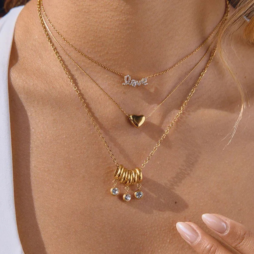 Vee Crystal Pendant Necklace in Gold